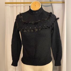 Chic Black Turtleneck Sweater with Fur Details